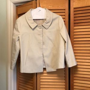 Dress jacket, great for the office. Has a crop feel to it. Nice thick material